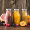 fresh-fruit-smoothies-wooden-background Promotie 3x Suc natural